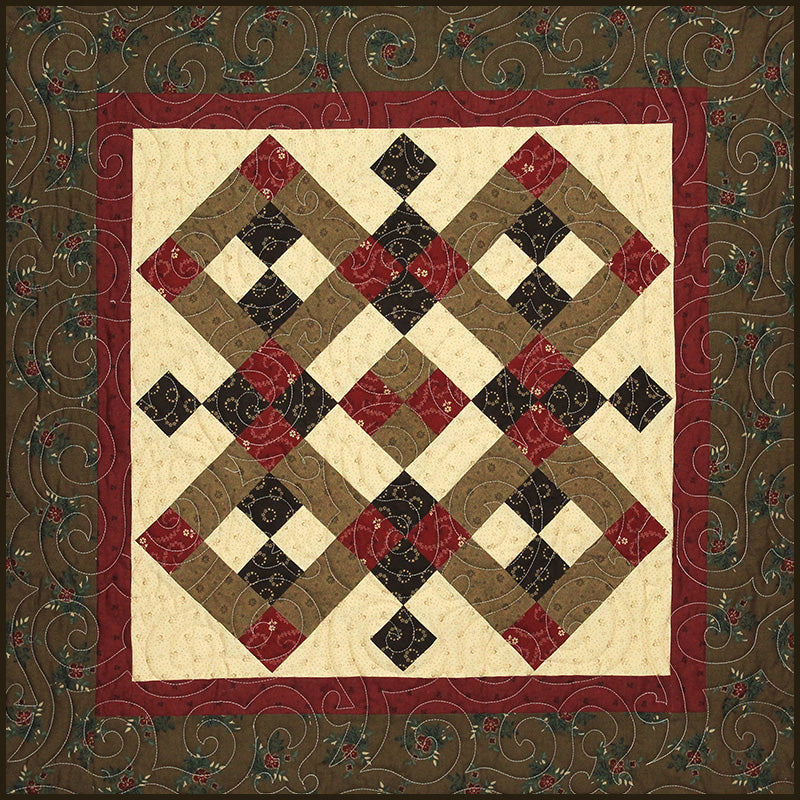 Annie's Fancy topper quilt in brown and red